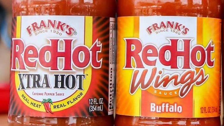 Two full bottles of Frank's RedHot sauce