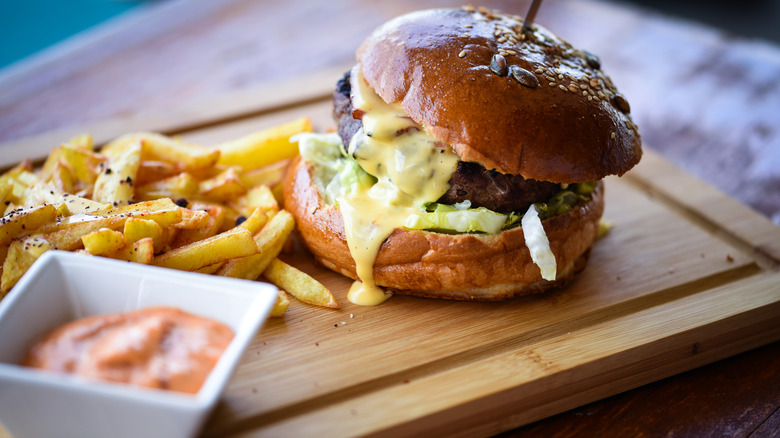 Burger with shoestring fries