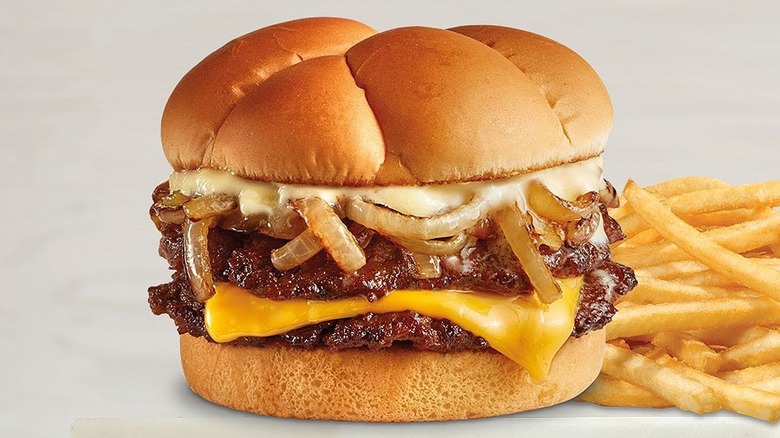 giant cheeseburger with onions