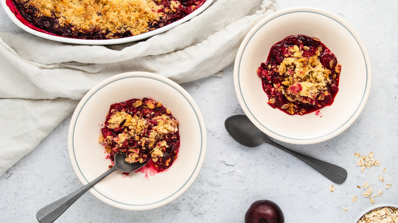 bowls filled with plum crumble
