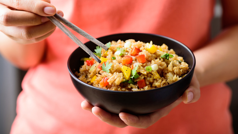 The Rookie Mistake That Leads To Clumpy Fried Rice
