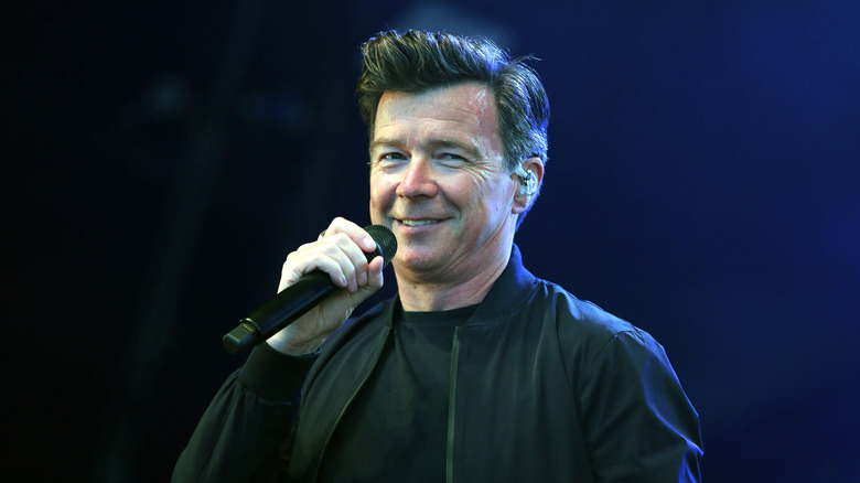 Rick Astley grinning