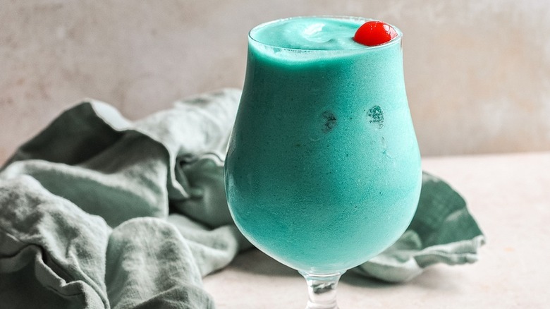 frozen blue cocktail with cherry