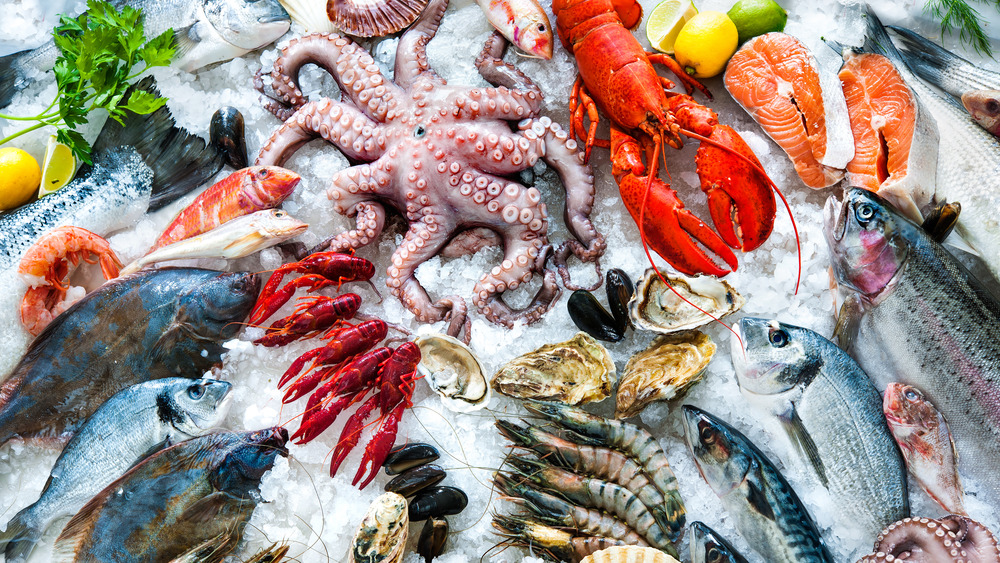 Variety of colorful seafood on ice