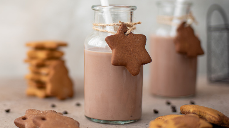 Cold chocolate beverage with cookies 