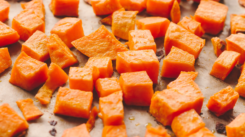 Sweet potato cubes on a baking sheet