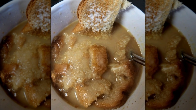 Bowl of coffee soup with bread.