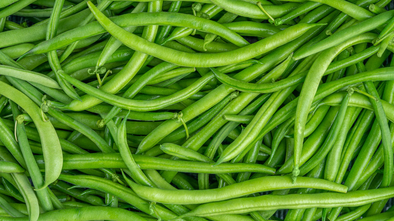 fresh green beans piled together