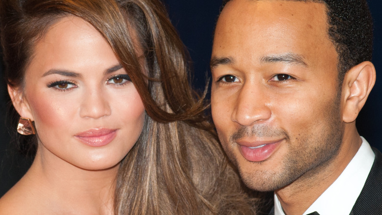 Chrissy Teigen and John Legend posing