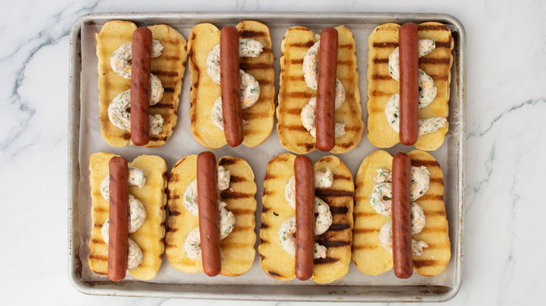 Hot dogs and cream cheese in grilled buns