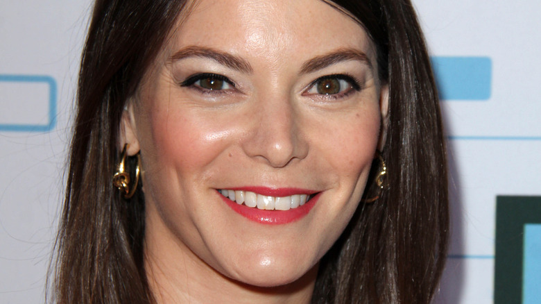 Gail Simmons smiling on red carpet