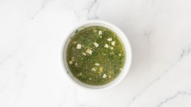 Herby garlic butter in bowl