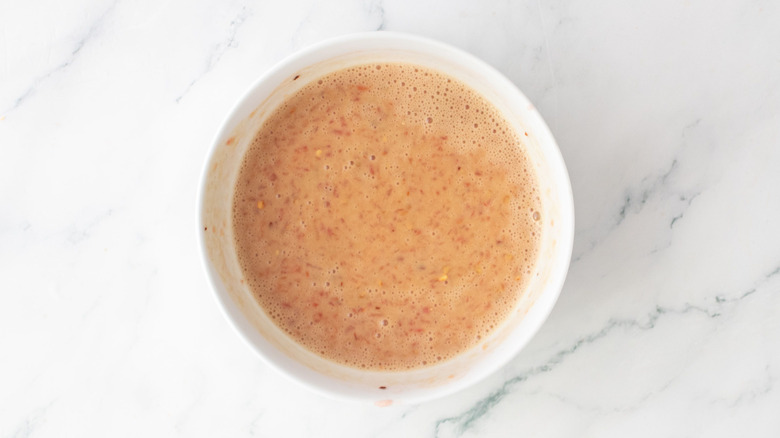 Tomato mustard dip in bowl