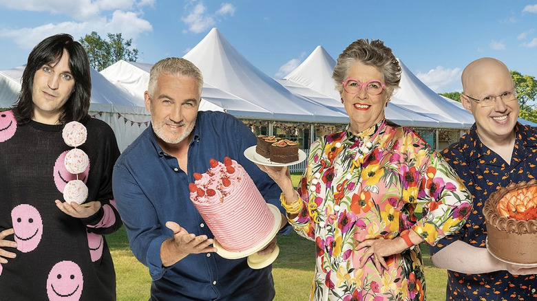 "The Great British Bake Off" judges holding cakes