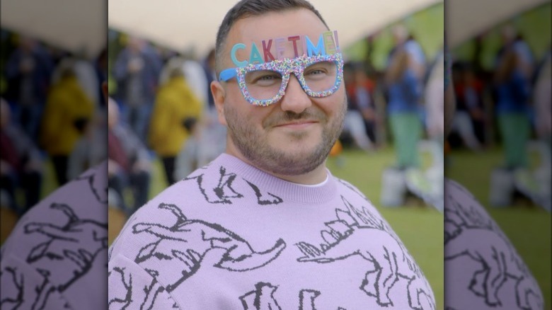 janusz wearing "cake time" glasses