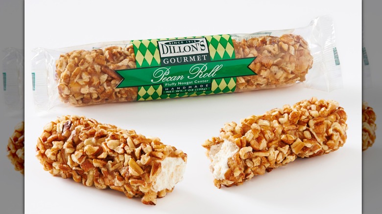 Two Dillon Pecan Rolls with one packaged and the other split in half.