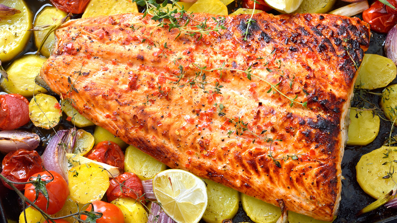 cooked salmon with lemons