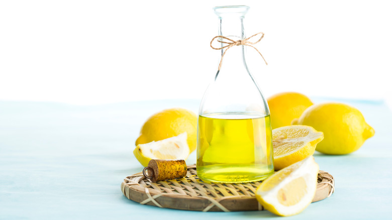 Lemons and a bottle of olive oil