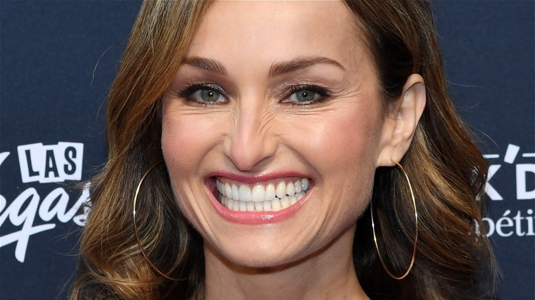 A close-up shot of Giada De Laurentiis giving a silly smile