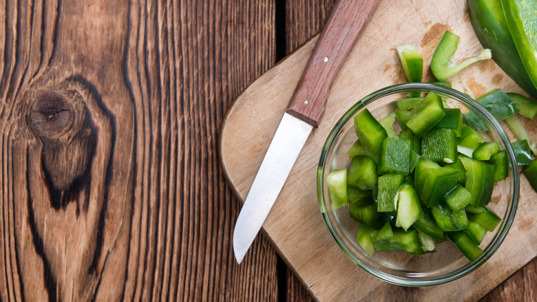 green peppers on cutting board