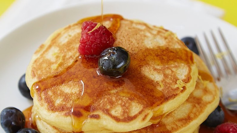 pancakes with syrup and berries