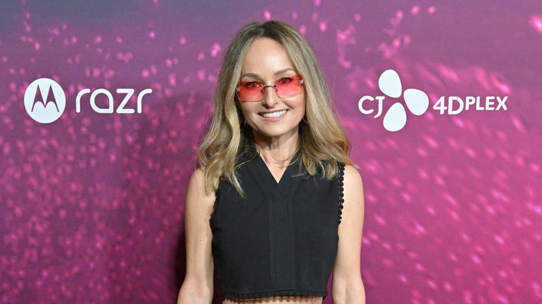 Giada De Laurentiis posing in sunglasses
