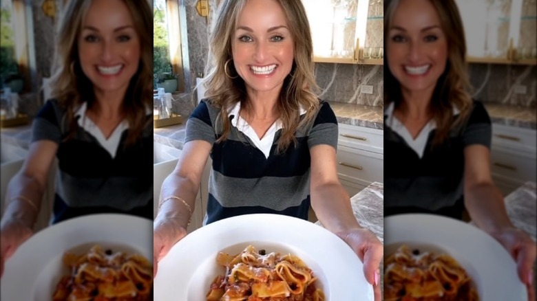 Giada De Laurentiis Holding Plate of Bolognese