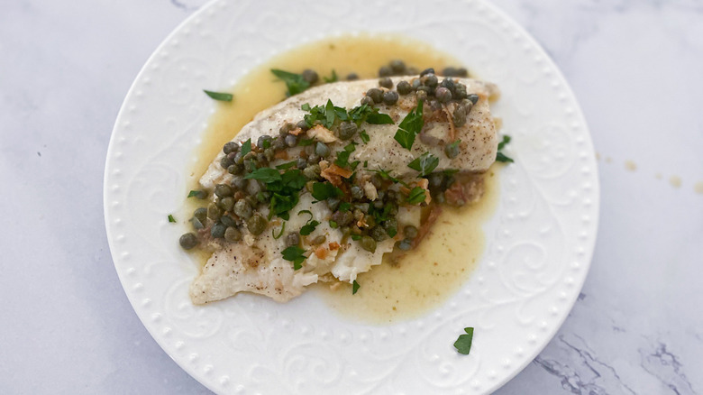 tilapia piccata on a dish