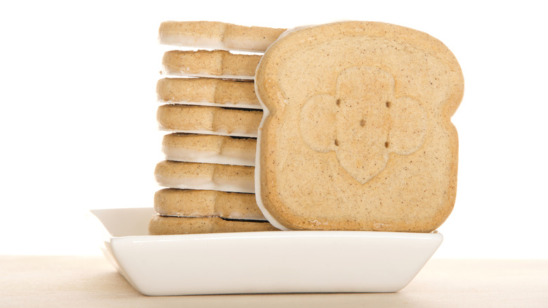 Stack of Toast-Yay Girl Scout cookies on white plate