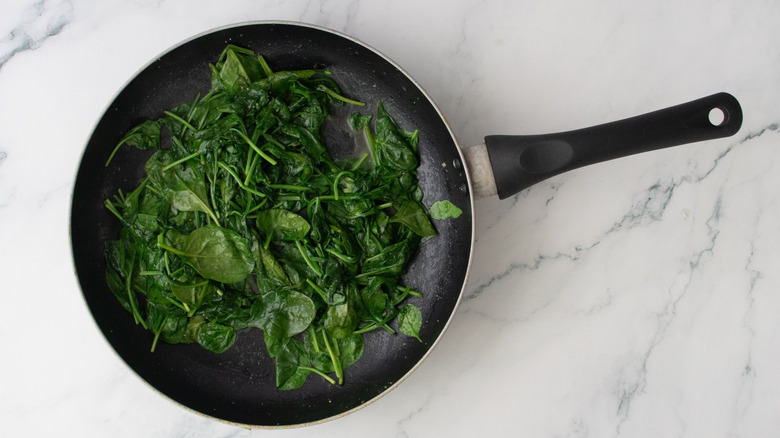 Wilted spinach in skillet