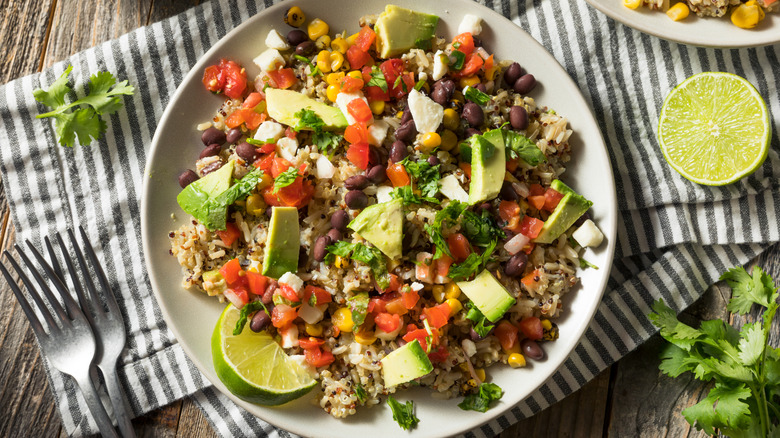 Quinoa salad with avocado, corn, black beans, and tomato