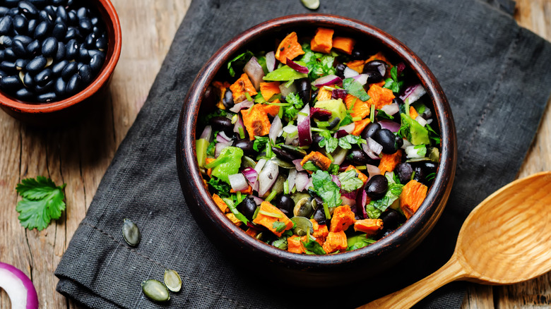Salad with black beans, cilantro, onion, and sweet potato