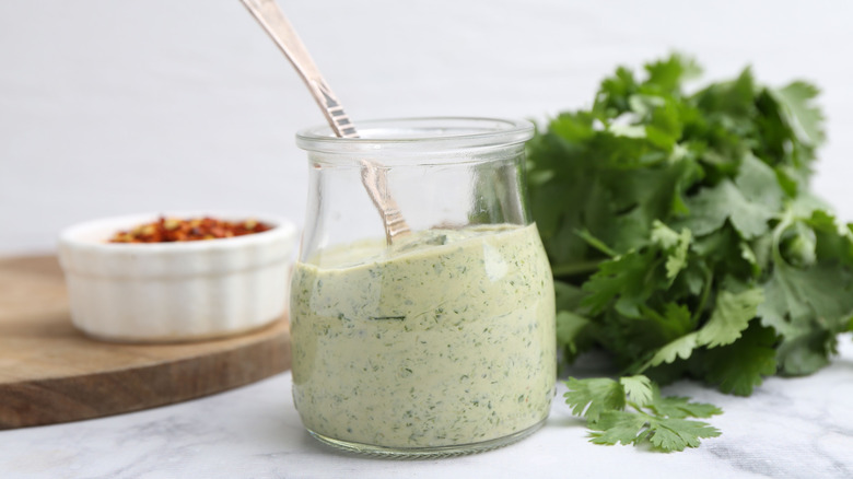Creamy cilantro dressing in a jar
