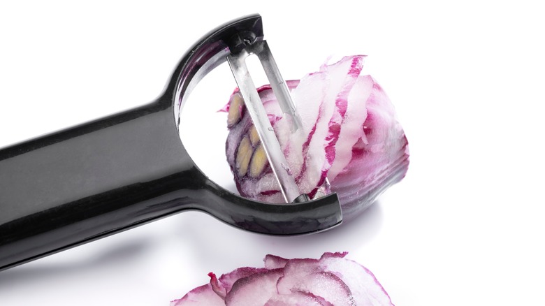 vegetable peeler shaving red onion