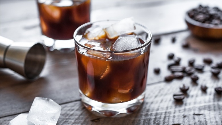 Coffee infused cocktail with coffee beans 