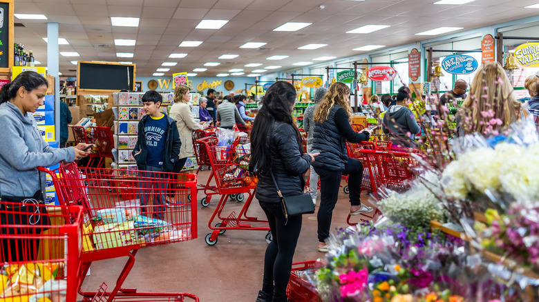 Trader Joe's check-out line and flower section