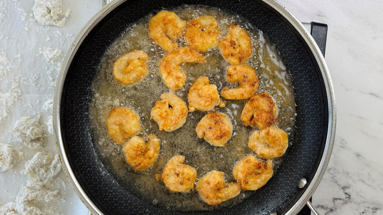 Golden fried shrimp in pan
