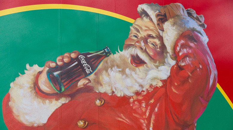 Coca Cola Santa advertisement on red and green