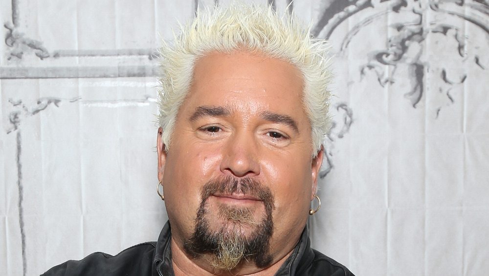 Guy Fieri smirking