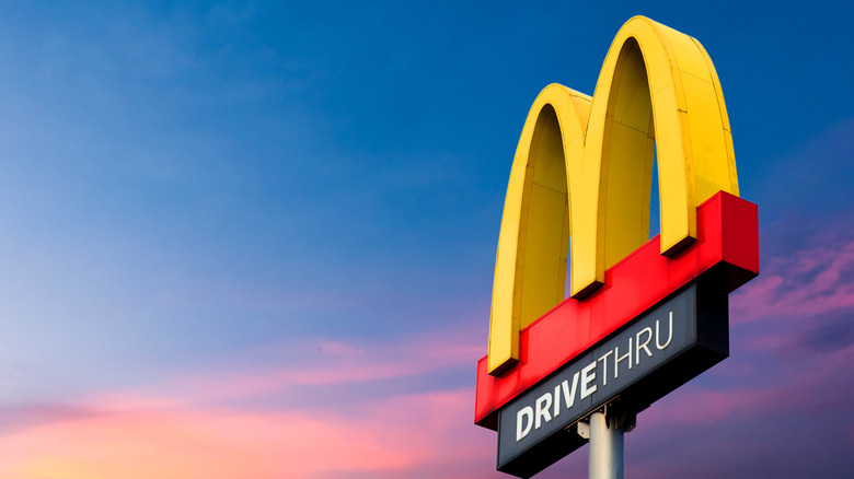 mcdonald's drive thru sign, golden arched M