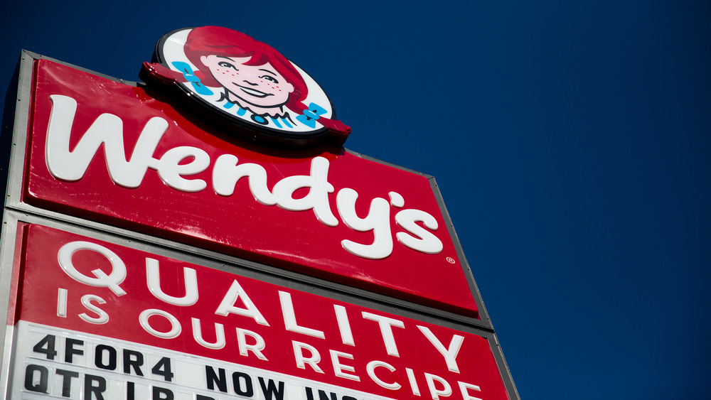 Wendy's sign against blue sky