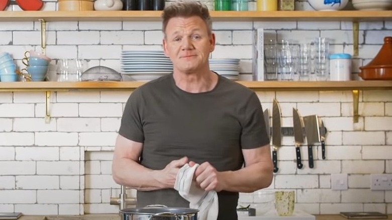 Gordon Ramsay on set in a kitchen