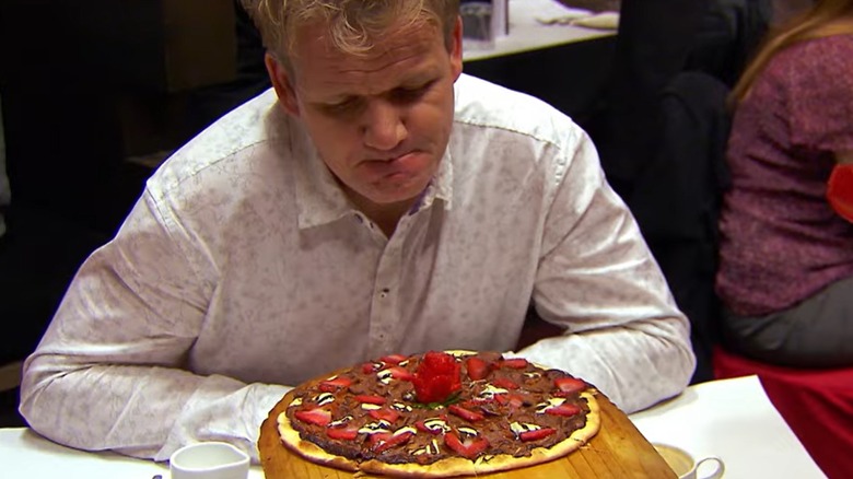Gordon Ramsay looks at chocolate strawberry pizza