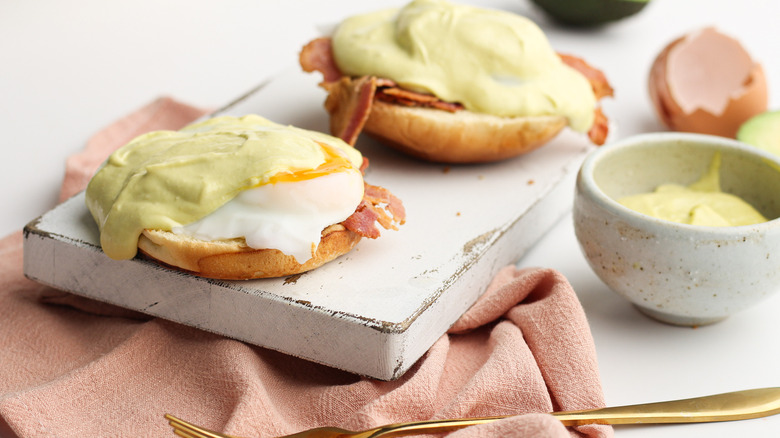 eggs Benedict with avocado hollandaise