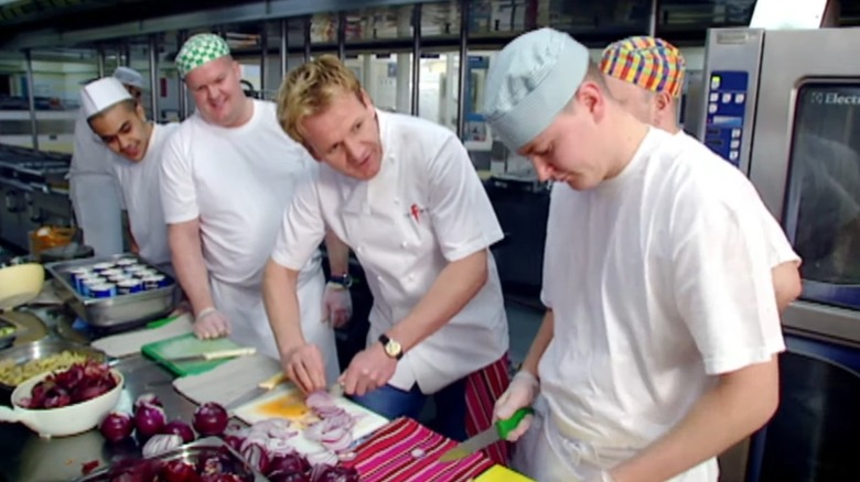 Gordon Ramsay has an onion cutting contest with a cook
