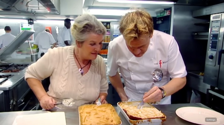 Gordon Ramsay and his mother, Helen Ramsay, inspect apple pudding recipes on "The F Word"