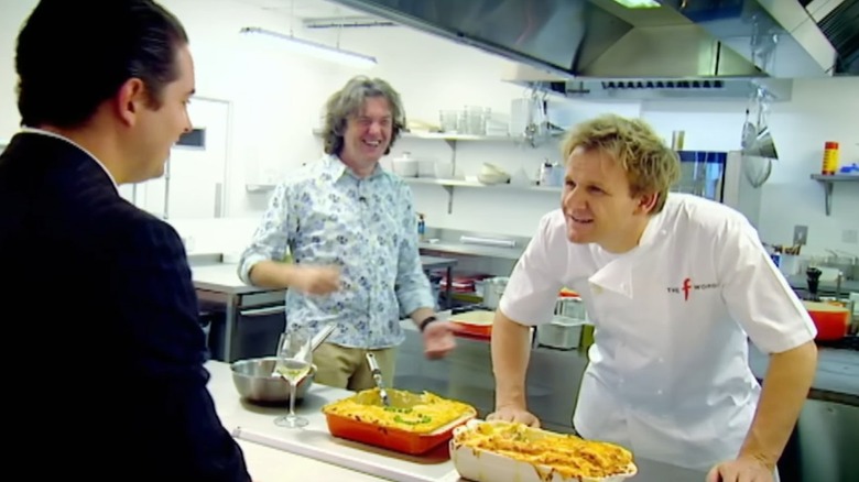 James May laughing at a scowling Gordon Ramsay on "The F Word"