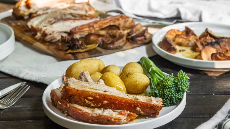 Pork belly with potatoes and broccoli