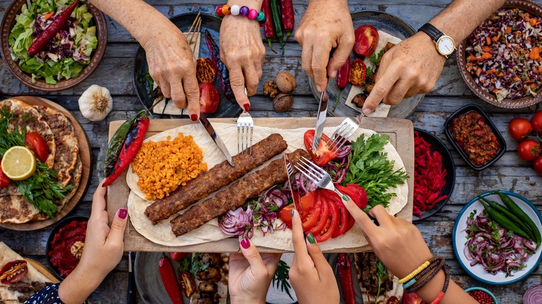 Friends sharing food 