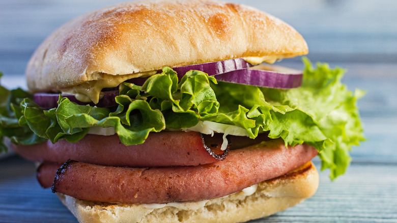 Bologna sandwich with lettuce and ciabatta bread